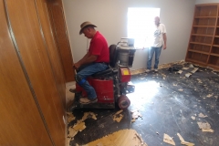 Carpet crews used a "Bronco" to tear out old carpet.